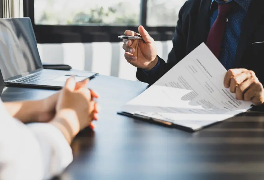businessman discussing business insurance claims with public adjusters