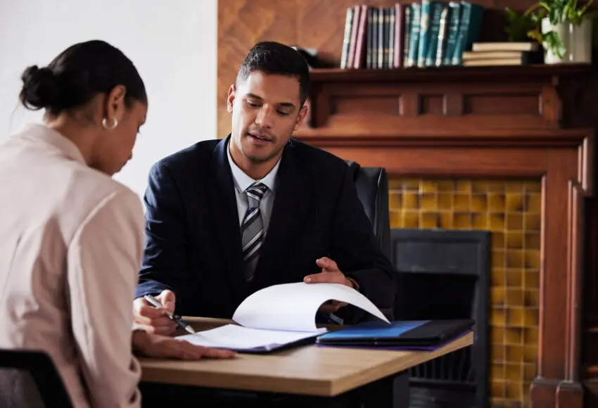 client discussing case with public adjuster