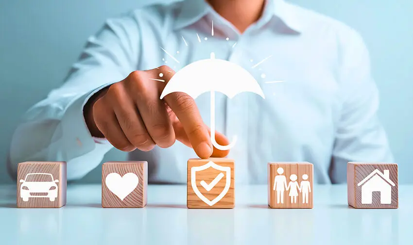 insurance claims adjuster - various wooden blocks symbolizing various insurance claims