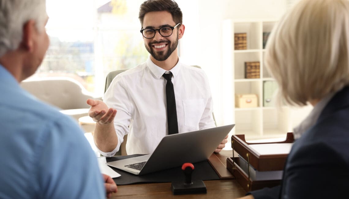 Public Adjuster and Home Owners in a meeting for home insurance claims' settlements