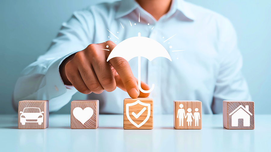 insurance claims adjuster - various wooden blocks symbolizing various insurance claims