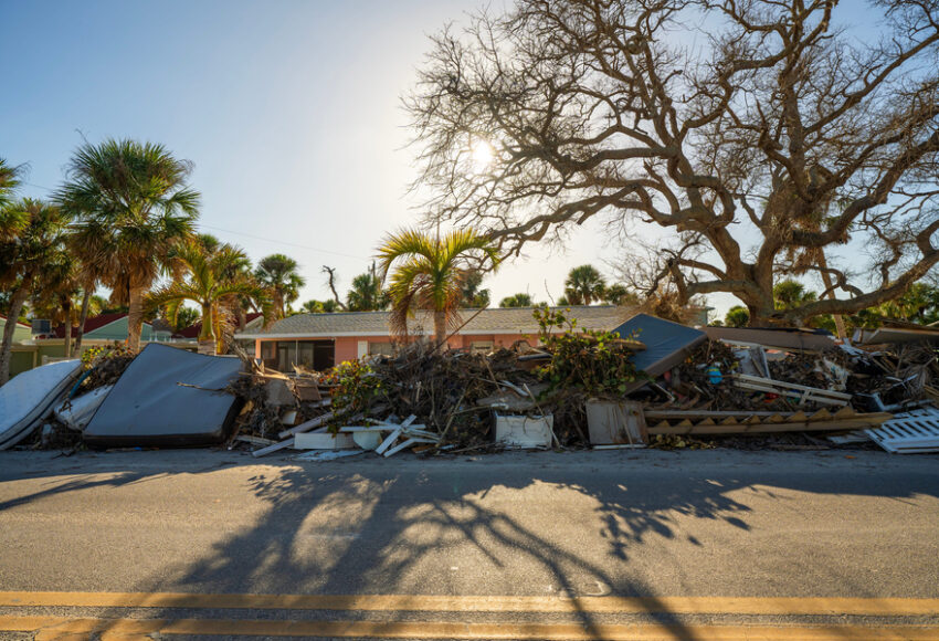 rash from severely damaged houses after hurricane storm surge