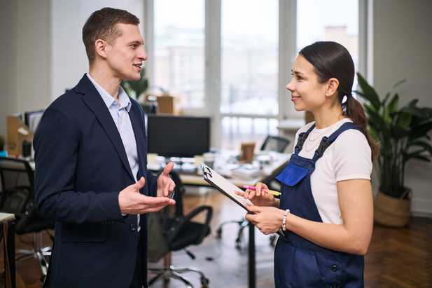 Public adjuster talking to a woman client